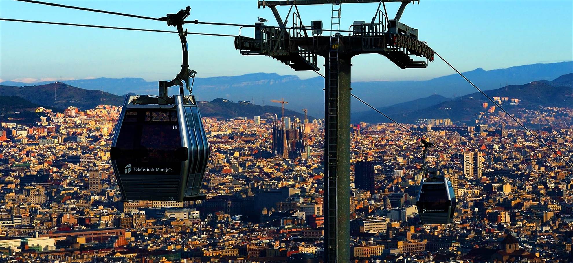 /barcelona/classificaties/attractions/telefericdemontjuic/teleferic-long-1529476558-1566206818.jpg Télécabine Barcelone - Teleferic de Montjuïc